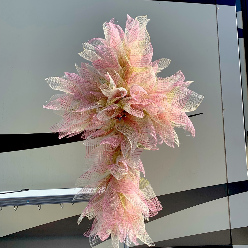 Beautiful cross with Angel wing shaped mesh ribbon. Just needs a bow.